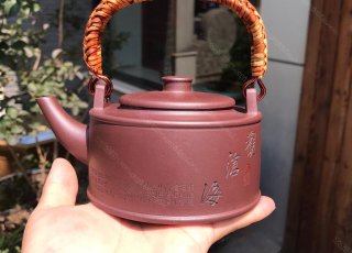 周盤(pán)提梁